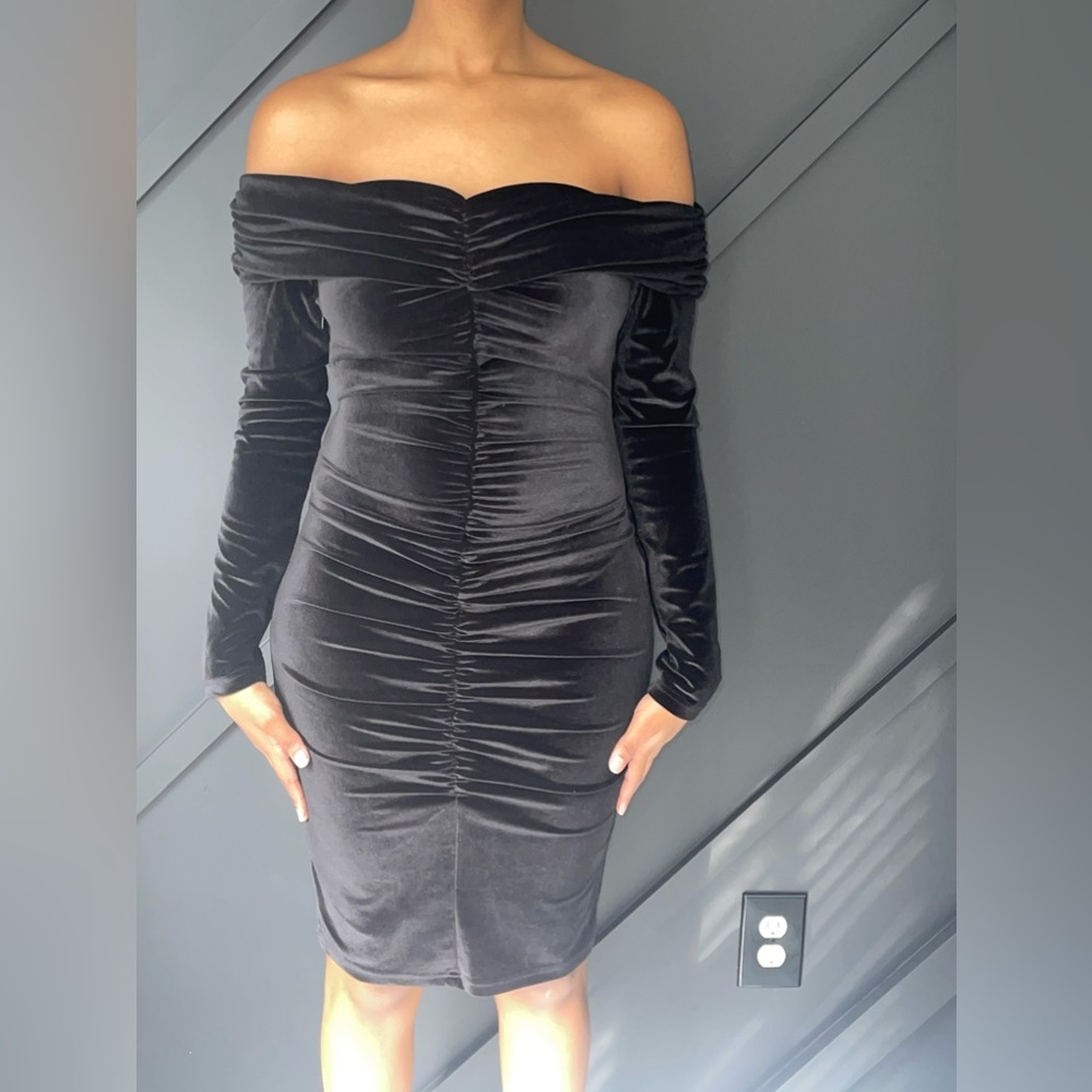 Velvet tight fitting black dress. Never worn